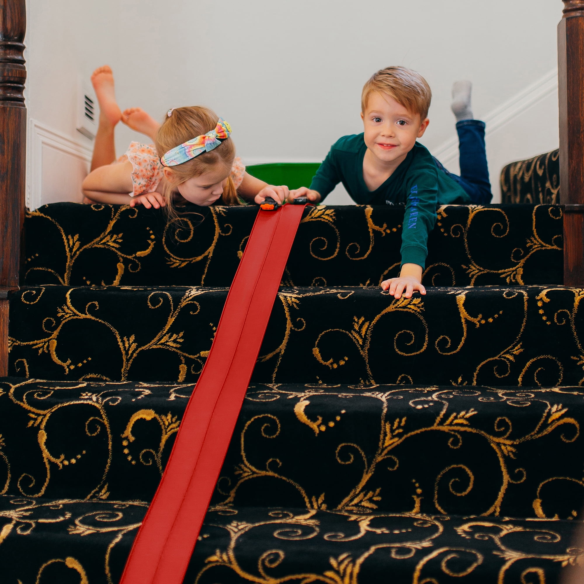 FlexTrack 5000 Flexible Race Car Track for Kids Toy with Suction Cups Compatible with Hot Wheels and Diecast 1/64th Cars and More 15 Feet Long Rolls Up Portable Racetrack (Rocket Red)