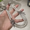 thumbnail image 6 of Layered Pearl Bow Necklace for Women, Multi Layer Choker with Heart Butterfly Cross Pendant, Vintage French Style Faux Pearl Chain Jewelry for Daily Wear Party Gift, 6 of 9
