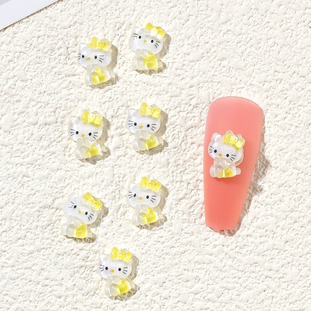 Comercio al por mayor 3D Permeable al Hielo Estéreo Hello Kitty Nail Charms Accesorios Dibujos Animados Kawaii Resina Nail Art