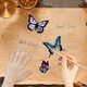 thumbnail image 4 of Sellos transparentes de silicona reutilizables con la palabra "Bendición" en alemán y forma de mariposa., 4 of 9