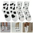 thumbnail image 3 of EeaseMX 2 pares de calcetines delicados de vacas de dibujos animados, calcetines peludos para mujer, calcetines de felpa de tubo, 3 of 8