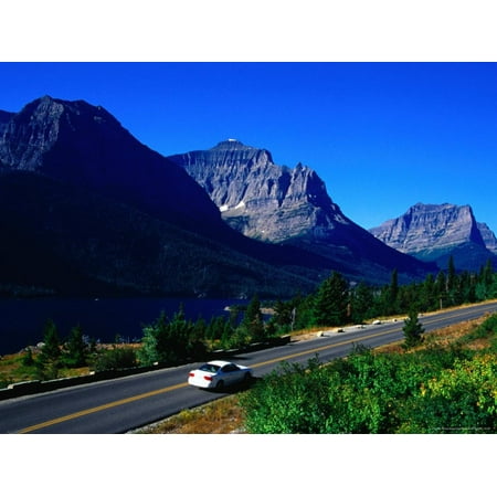 Car Driving on Road with Mountain Range Glacier National Park, Montana, USA Print Wall Art By Rob
