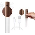 thumbnail image 1 of Lámpara de pared de madera recargable por USB con interruptor, luces de pared inalámbricas de batería para interiores con sensor de movimiento, luz blanca cálida magnética para dormitorio., 1 of 5