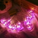 thumbnail image 1 of Cadena de Luces de Halloween Colco Decorativas Murciélagos Púrpuras 20 Luces, 1 of 8