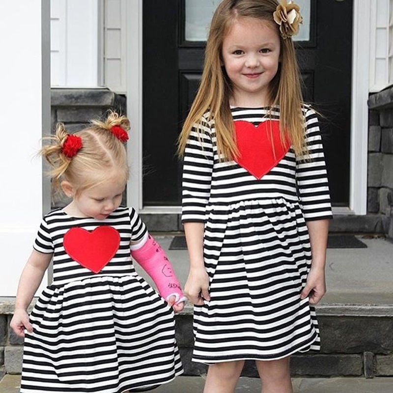 girls black and white striped dress