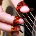 thumbnail image 2 of 4Pcs Celluloid Thumb Pick Set for Nail Guitar Picks Plectrum for Guitar Bass, 2 of 9