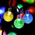 thumbnail image 1 of Guirnalda de luces solares para exteriores de 11 m y 60 LED, resistente al agua IP65, con 8 modos multicolor, luces decorativas para jardín, terraza, patio, casa, Navidad y boda., 1 of 5