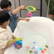thumbnail image 3 of Juguetes de baño con luz para bebés | Juguetes flotantes de animales marinos con sonido chirriante y red de pesca | Juguetes de piscina con luz LED activada por agua para niños de 1 a 3 años, 3 of 5