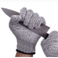 thumbnail image 1 of Guante de protección contra cortes fabricado en alambre de acero inoxidable - gran comodidad y corte seguro - práctico, fácil de limpiar y apto para alimentos - incluye guante de algodón (L), 1 of 1