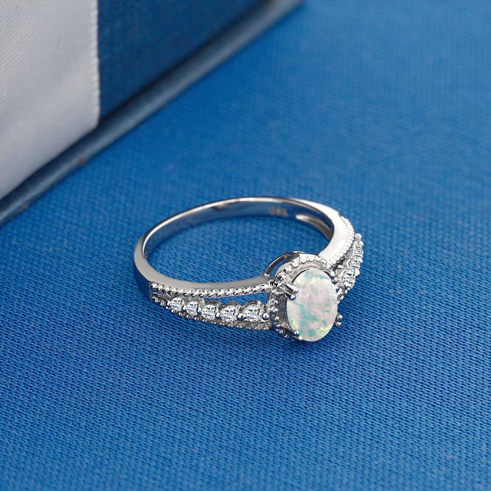 Gem Stone King 925 Sterling Silver White Simulated Opal and White Topaz Engagement Ring for Women (1.21 Cttw, Oval Cabochon 7X5MM, Available 5,6,7,8,9)