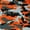 Black, Charcoal, Orange, Silver, variant on Ronit Textile Red Dimple Mesh Jersey Camouflage Print by Yard (36"X60")