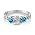 thumbnail image 2 of Gem Stone King 10K White Gold IGI Certified Lab Grown Diamond and Swiss Blue Topaz 3 Stone Engagement Ring for Women | 2.38 Cttw | Center Diamond Oval 1 Ct | E-F Color | VS1-VS2 Clarity | Size 9, 2 of 6