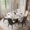 Glossy Pandora With Grey, variant on 51" Hobart Modern Round Dining Table for 4, White Glossy Sintered Stone Table, Gray Carbon Steel Pedestal