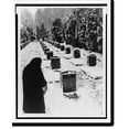 thumbnail image 2 of Historic Framed Print, [Woman in snow-covered military(?) cemetery where each tombstone has several names inscribed on it].Evgenii Khaldei., 17-7/8" x 21-7/8", 2 of 9