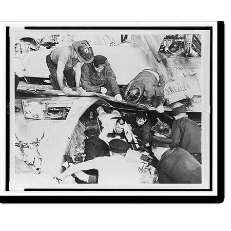 Historic Print, [Unidentified sailor being removed from wreckage of a Braniff airliner, which crashed while landing at Midway Airport, Chicago], 18" x 24"