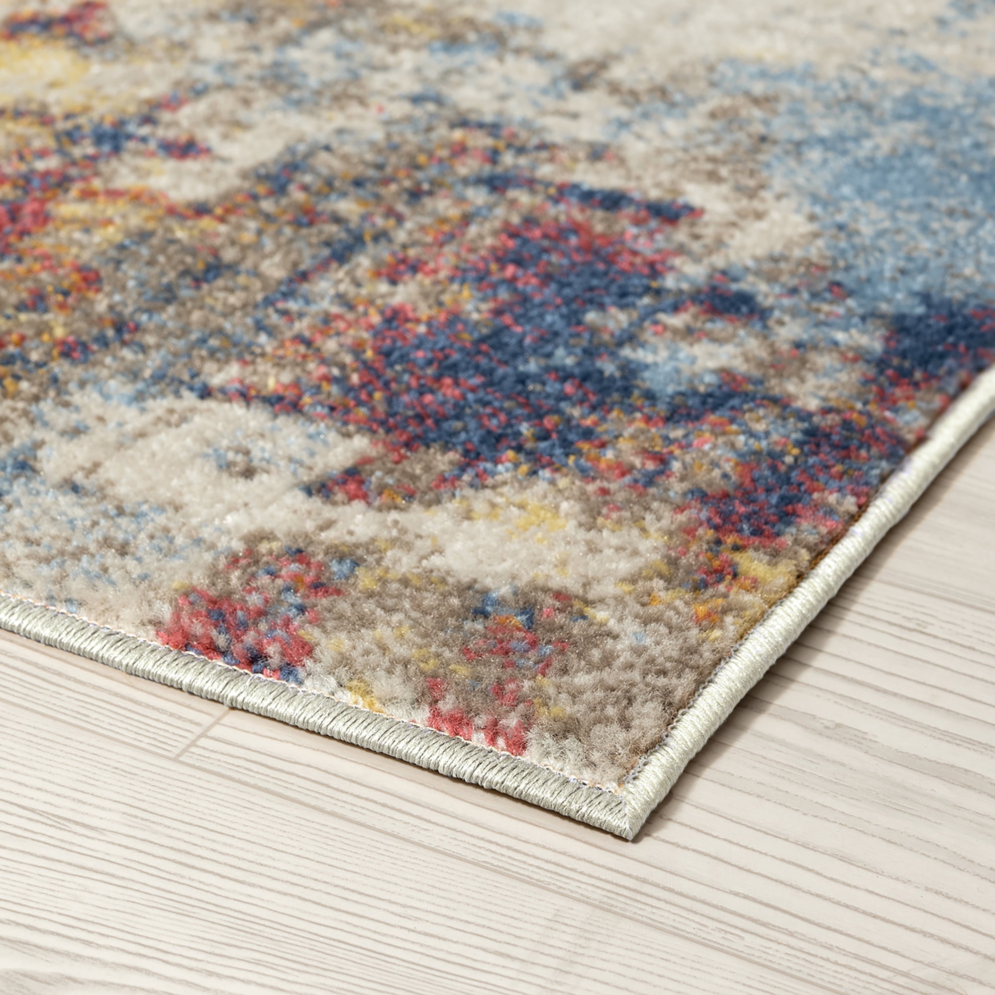 Chelsea Contemporary Abstract 6'7'' x 9'3'' Multi and Blue Polypropylene Indoor Area Rug, 6.7' x 9'