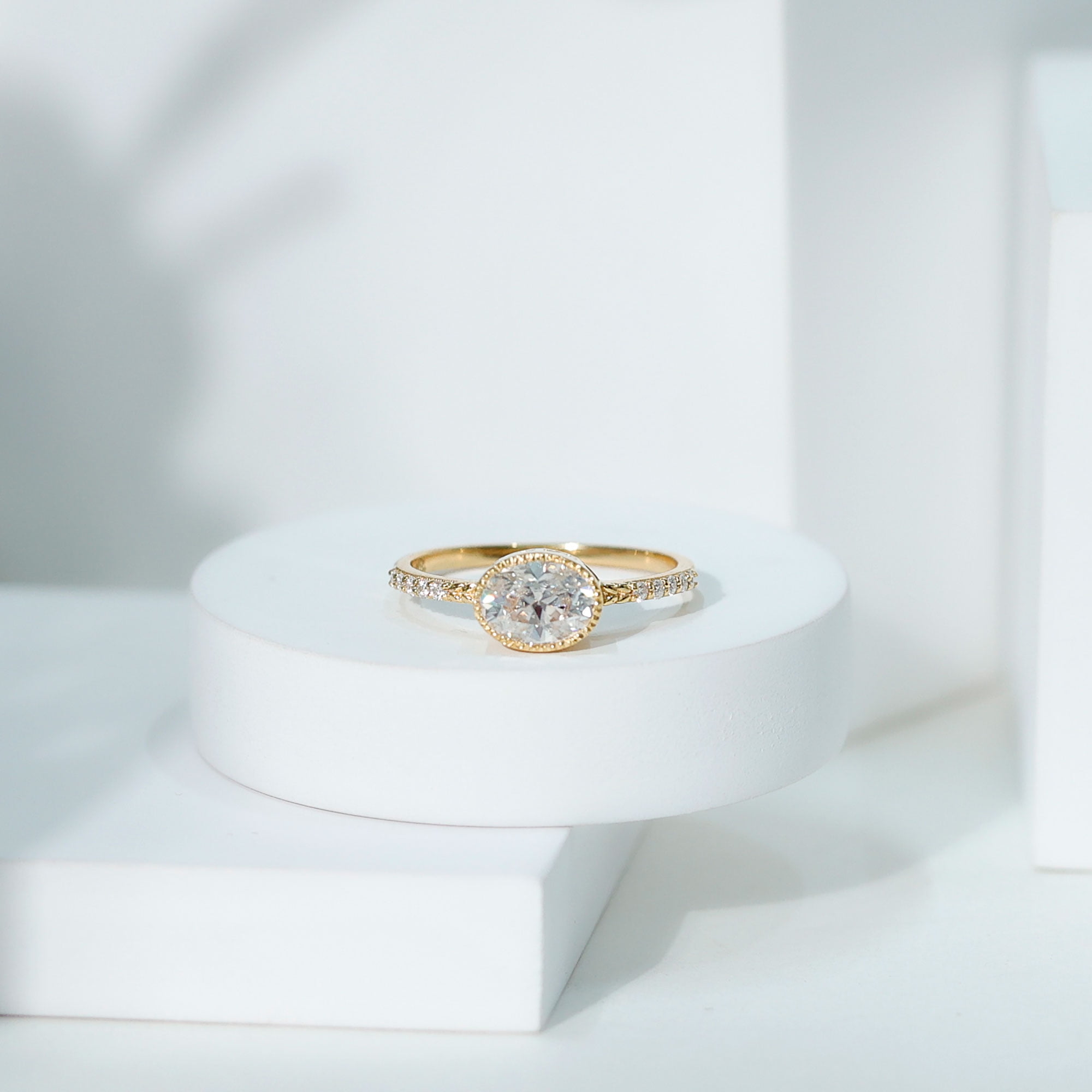 Rosec Jewels Moissanite Oval Engagement Ring 1 Carat - East West Ring for Women - 6X8 mm - D-VS1 Quality Certified, 14K Yellow Gold, US 10.00