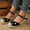 Black, variant on Womens Pearl Embellished Straw Wedge Sandals with Open Back Buckle, Natural Jute Espadrille Style Heels for Summer Wedding Beach Vacation