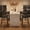 Black leather, variant on Bar Stools, Counter Height Stools Set of 4 26" Wide Seat with Arms & Back - Upholstered, Metal Footrest, Easy Assembly for Kitchen Island, Rustic Black Faux Leather