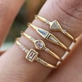 thumbnail image 6 of Womens Simple Geometric Golden Alloy Ring with Sparkling Rhinestone Inlay and Metal Stitch Detailing, Four-Piece Set, 6 of 6