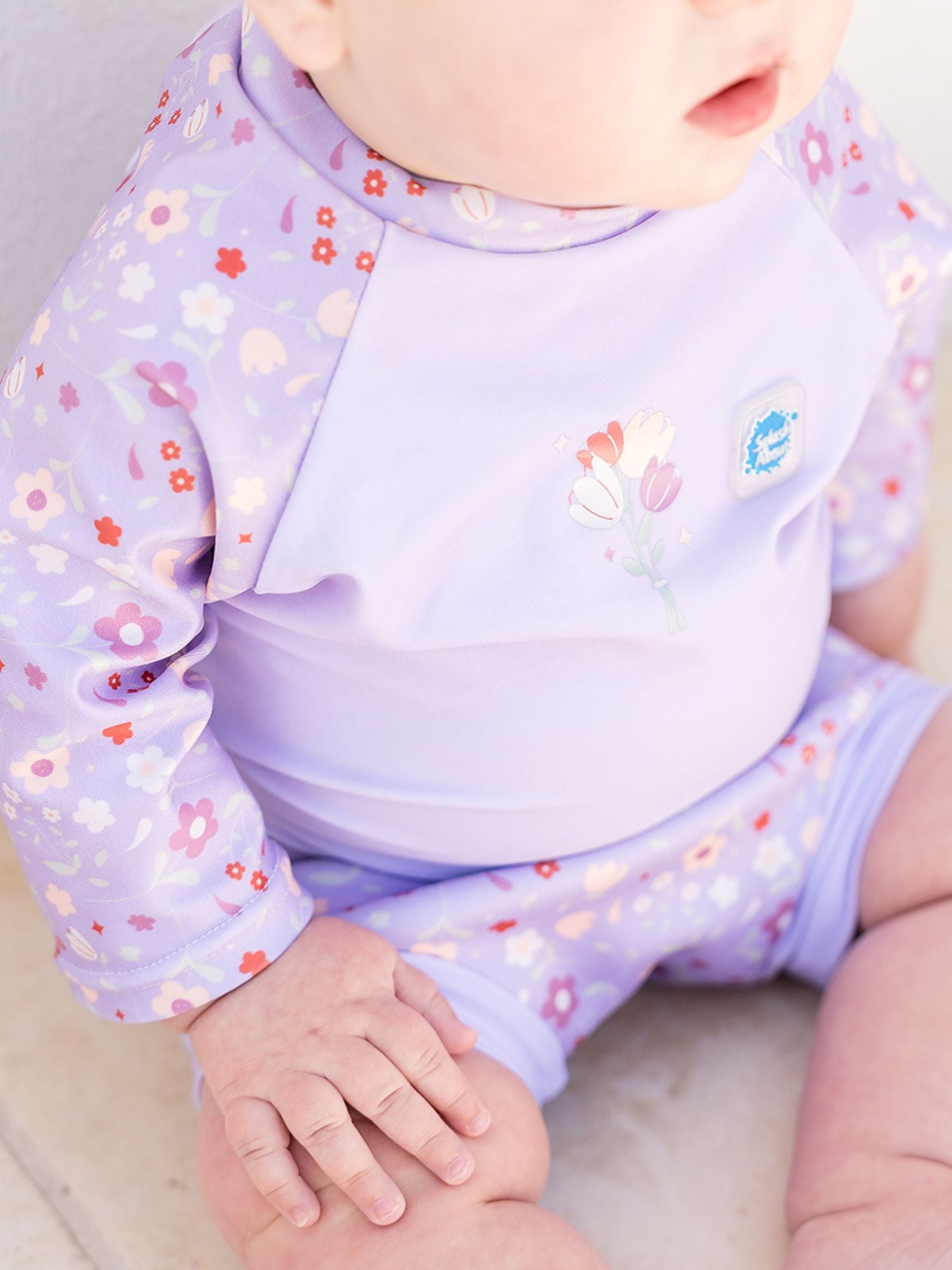 Splash About Happy Nappy Sunsuit with swim diaper, Lilac Spring, 12-24 Months