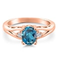 thumbnail image 3 of Gem Stone King 18K Rose Gold Plated Silver London Blue Topaz and White Lab Grown Diamond 3 Stone Engagement Ring for Women | 1.58 Cttw | Oval 8X6MM | Round 2MM | Gemstone November Birthstone | Size 7, 3 of 6