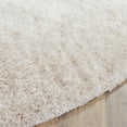 thumbnail image 4 of SAFAVIEH Henley Solid South Beach Polyester Shag Area Rug, Champagne, 6' x 6' Round, 4 of 6
