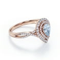thumbnail image 3 of JeenMata Twisted Infinity 1.75 Carat Pear-Shaped Created Aquamarine and Moissanite Pave Double Halo Cluster Engagement Ring in 18K Rose Gold Plating over Silver, 3 of 6