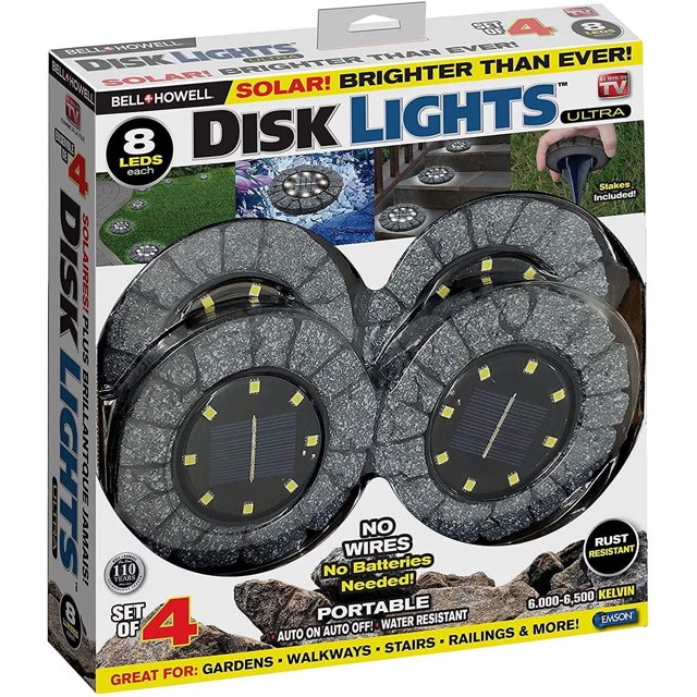 Bell + Howell Luminaire Disque Ultra Ensemble de 4, Éclairage Paysager à Énergie Solaire avec design à texture de Pierre. Ces Lumières Extérieures Offrent une Fonctionnalité Marche/arrêt Automatique, Sont Résistantes à l'Eau et à la Rouille, et Émettent une Lumière Blanc Froid de 6000–6500K. Parfait pour Jardins, Allées Piétonnes, Escaliers et Rampes.