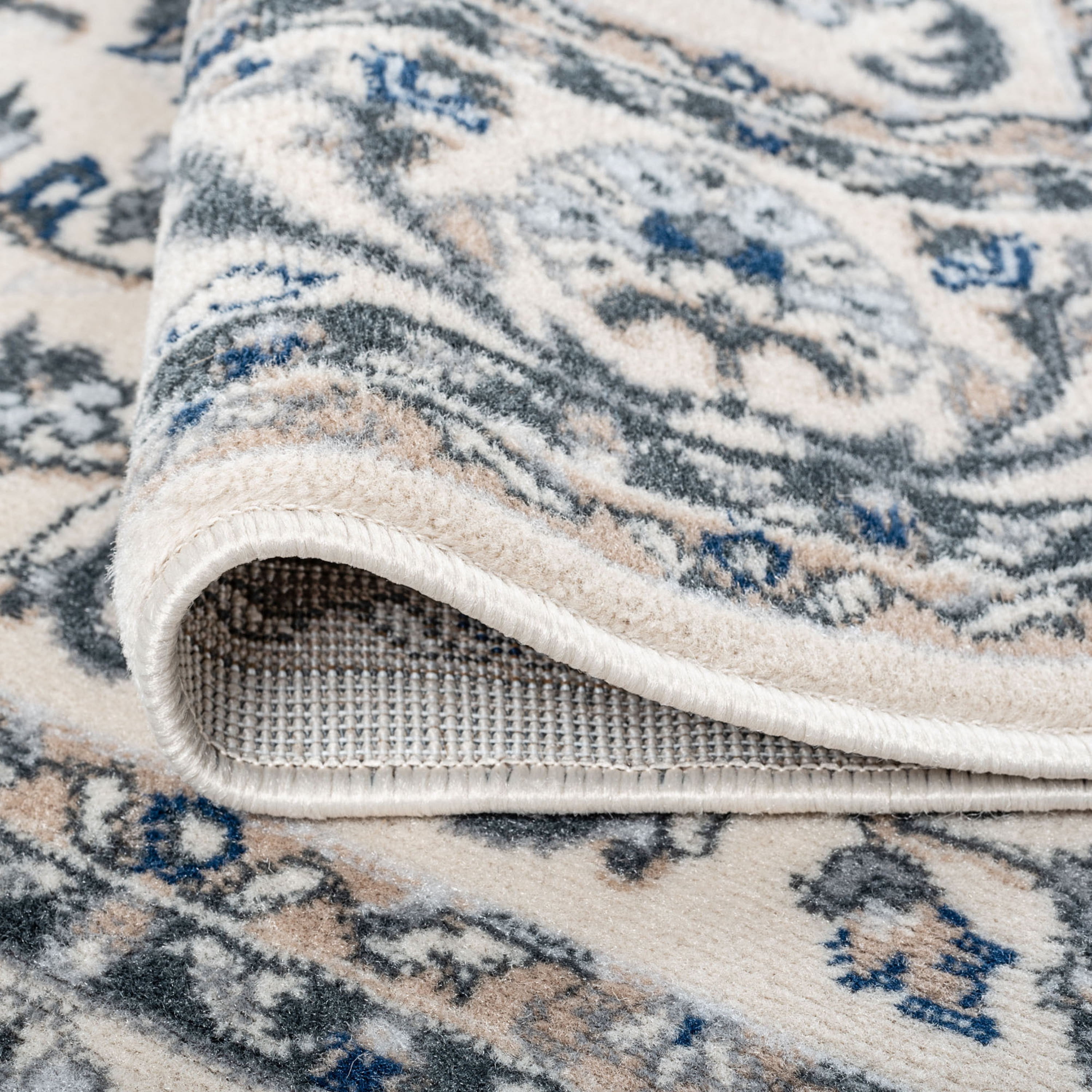 Madison Traditional 5' x 7' Cream Polypropylene Indoor Area Rug