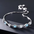 thumbnail image 4 of Gem Stone King 925 Sterling Silver White Moissanite and Swiss Blue Topaz Infinity Links Bracelet for Women (2.82 Cttw, Round 4.5MM, Fully Adjustable up to 9 inch), 4 of 5