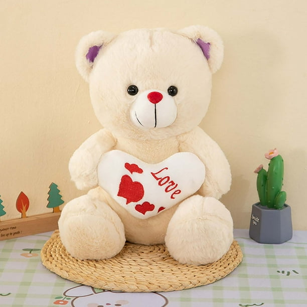 Osito abrazador de corazón, un adorable osito de peluche suave y cariñoso, ideal para abrazar.