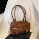 thumbnail image 4 of Bolso de axila multibolsillos de alta calidad para mujer, nueva versión coreana 2025, bolso Boston de mano de nicho, bolso de hombro de gran capacidad, 4 of 5