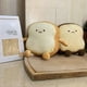 thumbnail image 2 of Almohada de pan tostado, divertida almohada de peluche con forma de pan, pequeña, 2 of 5