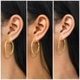 thumbnail image 2 of JeenMata Juego de 3 Aros con Baño de Oro Amarillo y Varios Diseños, 2 of 5