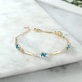 thumbnail image 3 of Gem Stone King 18K Yellow Gold Plated Silver Swiss Blue Topaz and White Topaz Tennis Bracelet for Women | 4.32 Cttw | Gemstone November Birthstone | Oval 7X5MM | 6 inch + 1 inch Extender, 3 of 3