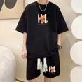thumbnail image 2 of Conjunto deportivo informal coreano de verano con capucha y estampado de gofres para hombre, pantalones cortos holgados de manga corta, conjunto de 2 piezas, chándal con estampado de moda, 2 of 5