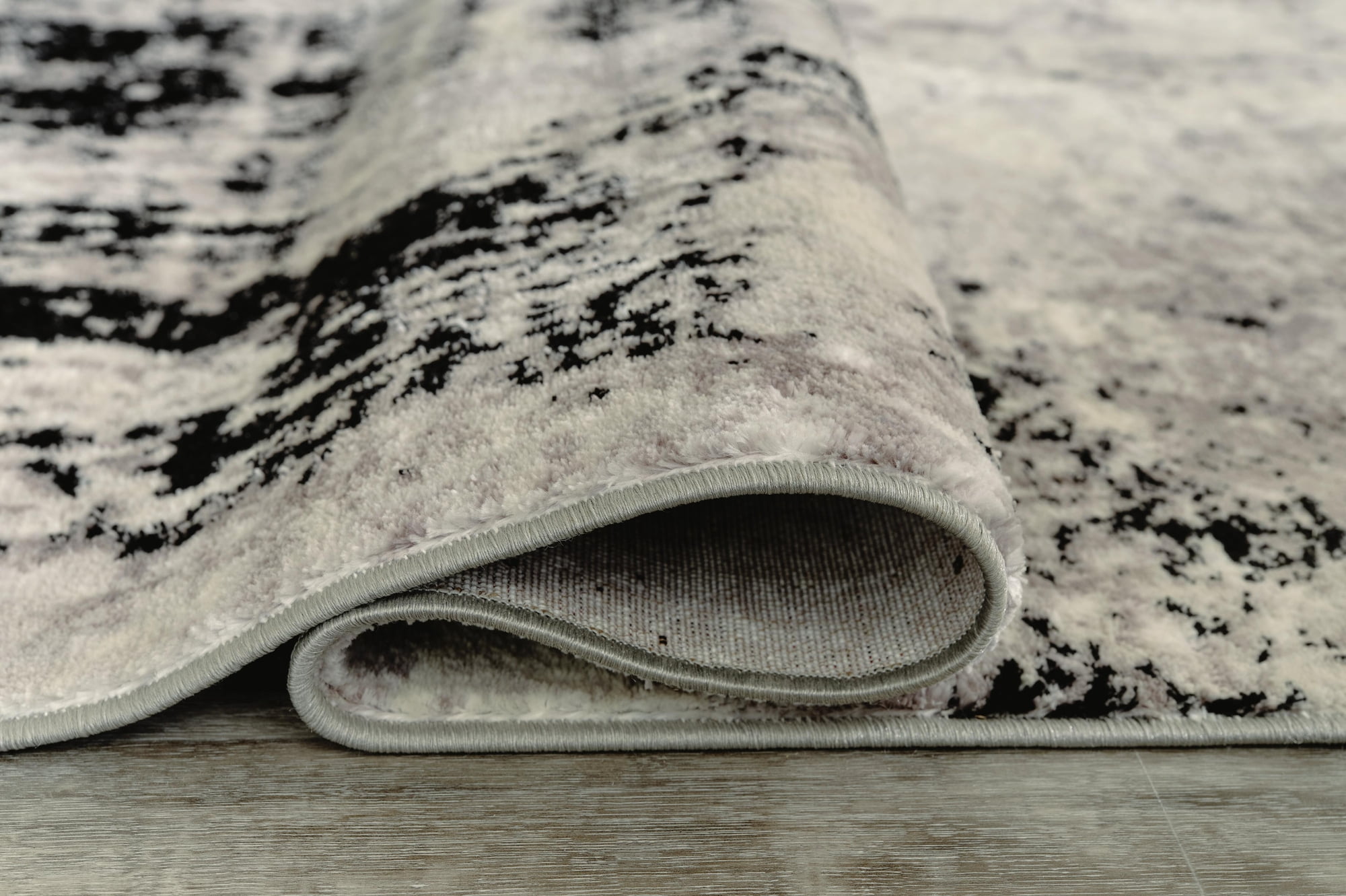 Signature Design by Ashley Contemporary Zekeman 5'3" x 7'7" Rug Black/Cream/Gray