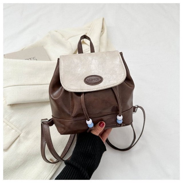 Mochila de mensajero de un solo hombro, estilo coreano, sencilla, a la moda, informal, de otoño e invierno, pequeña, a juego con colores retro, 2025