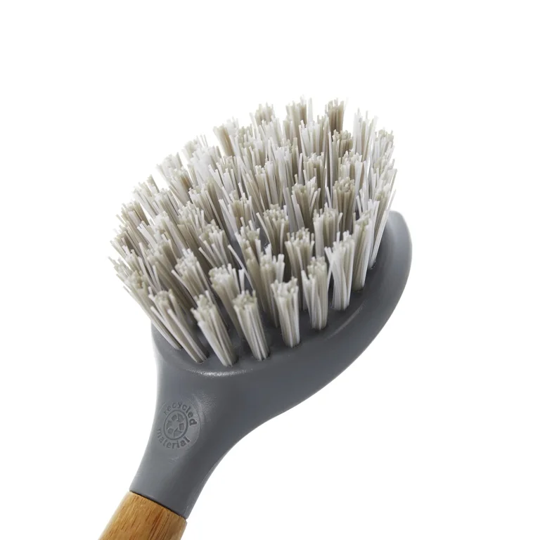 My favorite, everyday cast iron accessories: stiff, natural bristle brush;  chainmail scrubber with silicone core; flat, steel spatula with (slightly  burned) wooden handle. : r/castiron