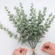 thumbnail image 3 of 14.96quot; Tallos de eucalipto artificiales, vegetación falsa para decoración de mesa de café, casa de campo, decoración del hogar, decoración de bodas y coronas para hacer hojas de plantas falsas (os Feliz Sencillez, 3 of 4