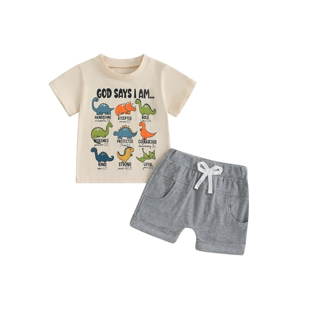 Conjunto de verano para niño pequeño: camiseta de manga corta con cuello redondo y estampado de letras de dinosaurios con pantalones cortos lisos.