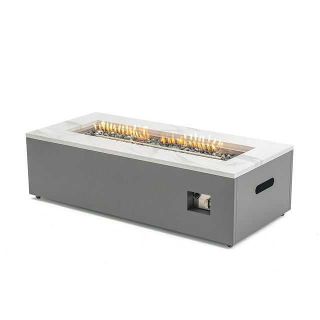 Rectangular Aries Engineered Marble Convertible Propane Fire Table in white and grey with burning flames on top.