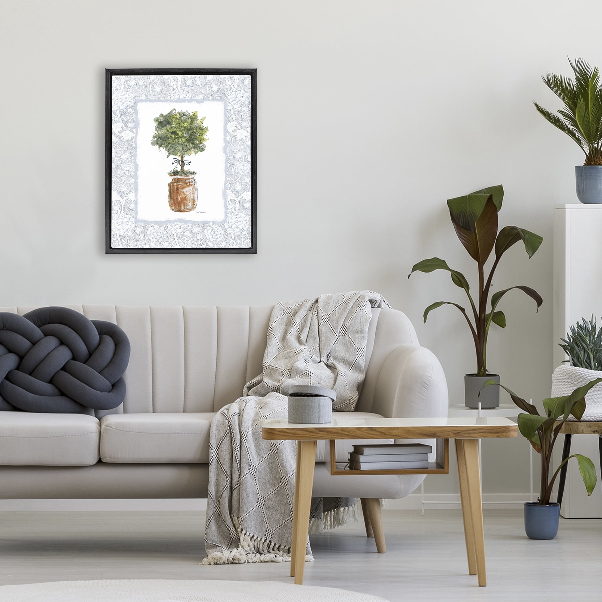 Stupell Industries Potted Topiary with Ribbon Black Framed Floater Canvas Wall Art, design by Carol Robinson