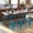 Teal, variant on Emma + Oliver Set of Four Teal Table Height Backless Stacking Welded Iron Stools with Wooden Seats and Under Seat Bracing for Indoor Use