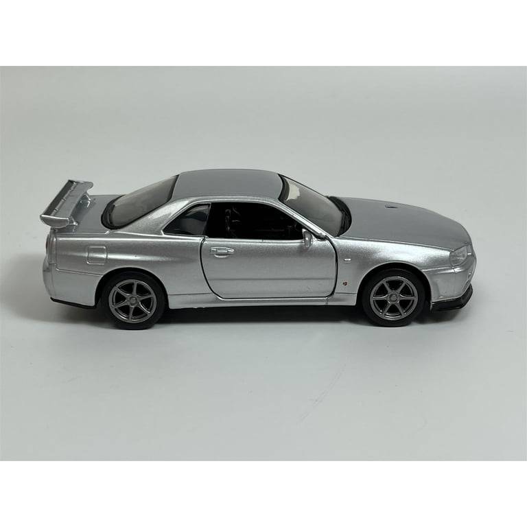 Nissan GT R34 V Spec II RHD Silver 1:36 Scale Tayumo Nissan GT R34 V Spec II RHD Silver 1:36 Scale Tayumo