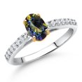 thumbnail image 2 of Gem Stone King 10K White and Yellow Gold Blue Mystic Topaz and White Lab Grown Diamond Engagement Ring for Women (1.13 Cttw, Oval 7X5MM, Gemstone Birthstone, Size 9), 2 of 4