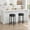 Black, variant on Huisuilinss 24"H Swivel Bar Stools With Footrest,Modern Backless Round Barstool,Metal Frame Counter Height Barstools With PU Leather,Upholstered Armless Bar Chair For Kitchen Pub Cafe