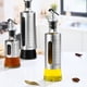 thumbnail image 3 of Botella de aceite Botellas de condimentos Contenedor Dispensador de suministros de cocina de acero inoxidable Herramienta de almacenamiento antideslizante Salsa para vinagre de soja Escala de 200ML Inevent HA009719-04B, 3 of 7