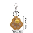 thumbnail image 4 of Llavero de huellas de pata de perro | Colgante para almacenamiento de pelo de mascota | Accesorio de recuerdo de cuero | Ficha conmemorativa | Amuleto de bolso multiusos | Compacto, ligero, 4 of 5